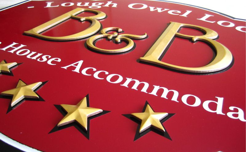 Detail: Gilded Prismatic Raised Letters